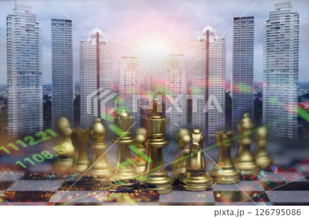The chess king on the board symbolizes strategy, challenge and intelligence in the business game. 126795086