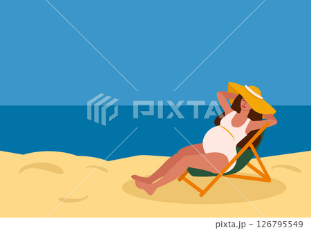 Pregnant woman in swimsuit relaxing in sun lounger by the sea 126795549