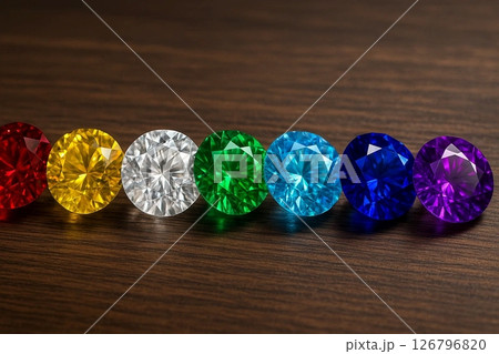 Colorful Gemstones on Rustic Wooden Surface 126796820
