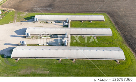 Aerial view above a confined animal operation hog building 126797360