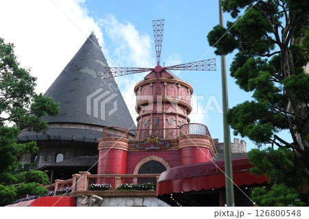 Ba Na Hills Da Nang Vietnam 05.21.2025 Danang attractions Moulin Rouge Windmill France Replica castles palaces art tourism place for photos blue sky with-white clouds famous place Ba Na Hills Da Nang Vietnam 05.21.2025 Danang attractions Moulin Rouge Windmill France Replica castles palaces art tourism place for photos blue sky with-white clouds famous place 126800548
