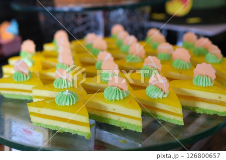 a plate of colorful Indonesian layered cakes 126800657