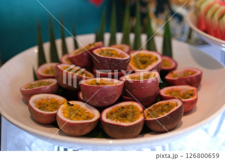 Passion Fruit, Maracuya on a White Background. Fresh Organic Passionfruit Plant Exotic Fruits Close up 126800659