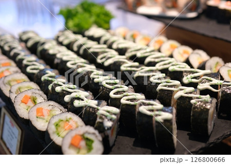 buffet beautiful food presentation serving culinary art, creating an appealing presentation of japanese cuisine. Japanese food sushi and rolls macro footage. buffet beautiful food presentation serving culinary art, creating an appealing presentation of japanese cuisine. Japanese food sushi and rolls macro footage. 126800666