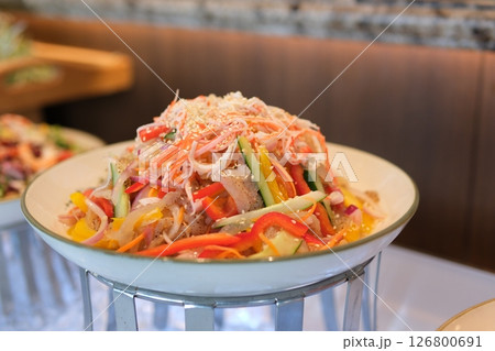 glass vermicelli with vegetables Glass noodles with shrimps and seafood, vegetables, spices and soy sauce on dark concrete background glass vermicelli with vegetables Glass noodles with shrimps and seafood, vegetables, spices and soy sauce on dark concrete background 126800691