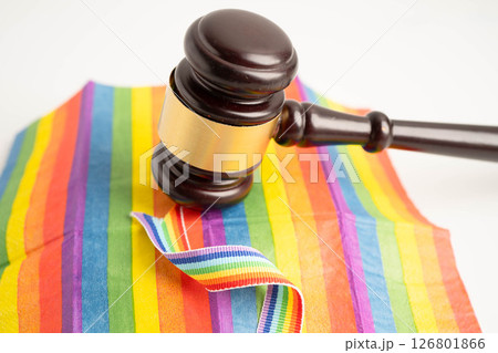 Gavel for judge lawyer on rainbow flag, symbol of LGBT pride month. 126801866