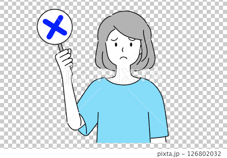 一位年輕女子手拿十字標記,表情悲傷 一位年輕女子手拿十字標記,表情悲傷 126802032