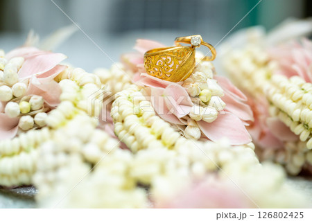Gold ring , Wedding ring,Diamond ring on the flowers. 126802425