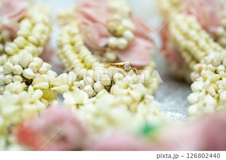 Gold ring , Wedding ring,Diamond ring on the flowers. 126802440