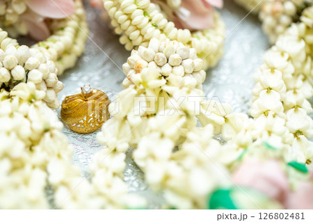 Gold ring , Wedding ring,Diamond ring on the flowers. Gold ring , Wedding ring,Diamond ring on the flowers. 126802481