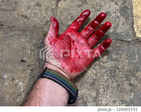 Crime scene with human hand in blood on the floor. High quality photo 126802531