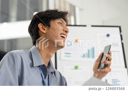 Remote Work and Digital Transformation. Happy professional engaging in a video call. Remote Work and Digital Transformation. Happy professional engaging in a video call. 126803568