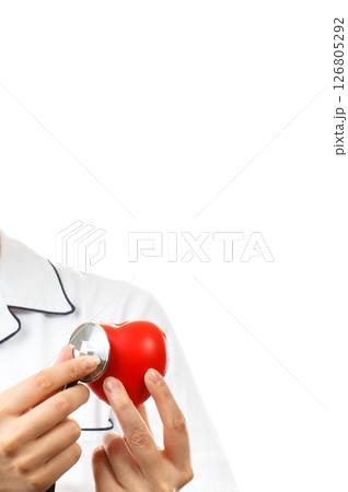 Hand of doctor with stethoscope examining red heart Hand of doctor with stethoscope examining red heart 126805292