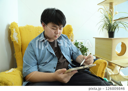 Teeager with Technology 126809846