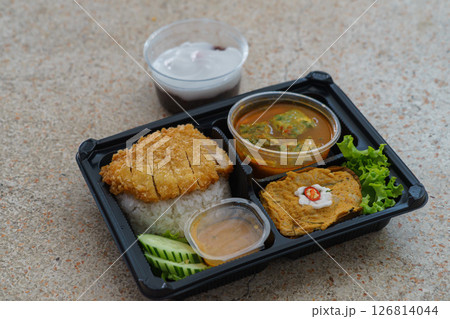 Thai Bento Box with Fried Pork Cutlet, Curry, and Traditional Dessert 126814044
