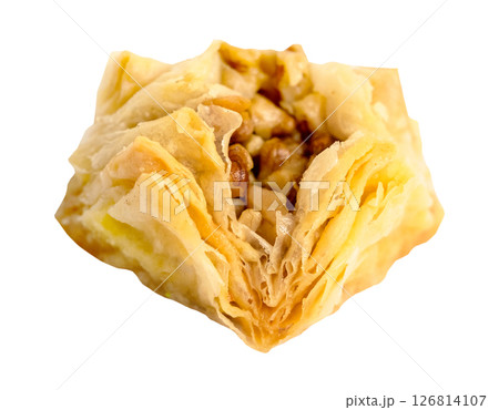 piece of layered baklava with peanuts cut out piece of layered baklava with peanuts cut out 126814107