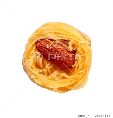 top view of piece of baklava with almond cut out top view of piece of baklava with almond cut out 126814111