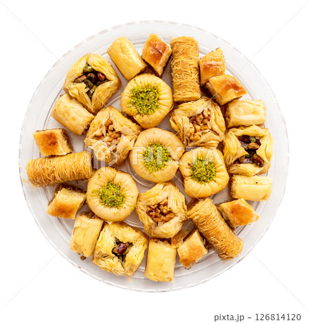 top view of various baklava on round plate cut out 126814120