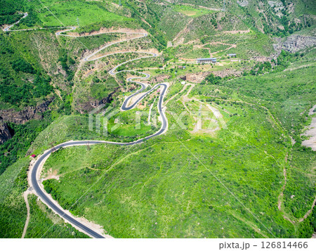 top view of mountain plateau with serpentine road top view of mountain plateau with serpentine road 126814466