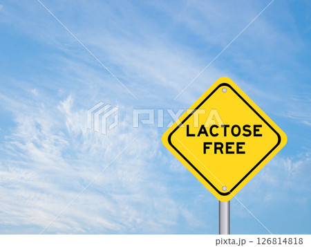 Yellow transportation sign with word lactose free on blue color sky background 126814818