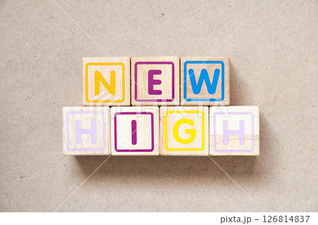 Alphabet letter block in word new high on wood background 126814837