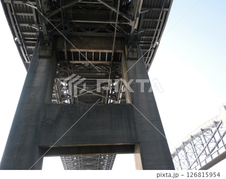 Bridges over the Tamar (Cornwall to Devon, UK), Different views from underneath the two bridges over the Tamar from the Saltash, Cornwall side. Taken in the early morning. Bridges over the Tamar (Cornwall to Devon, UK), Different views from underneath the two bridges over the Tamar from the Saltash, Cornwall side. Taken in the early morning. 126815954