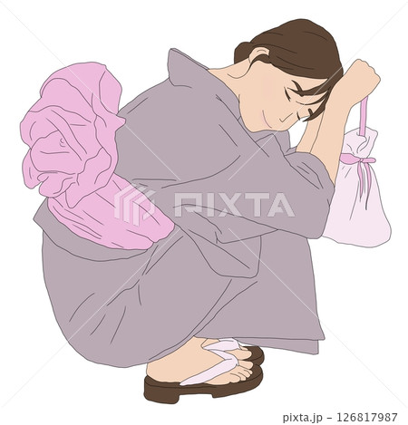 浴衣を着てしゃがんでいる女の子 126817987