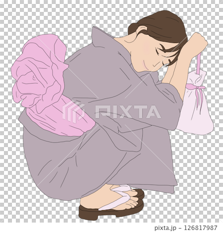 浴衣を着てしゃがんでいる女の子 126817987