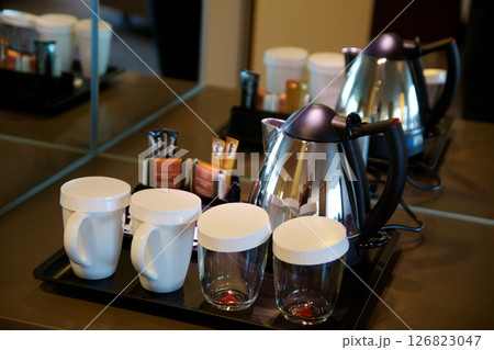 Mainz, Germany, July 8, 2017: Hotel Room Coffee and Tea Station with Porcelain Cups and Glasses 126823047