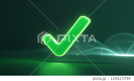 Bright green glowing check mark symbol with luminous effects on dark background for approval and verification 126823794
