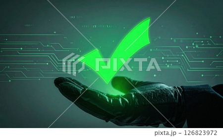 futuristic digital check mark with circuit lines glowing in green on a hand against technological background 126823972