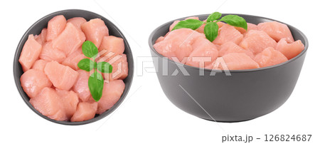 Raw diced chicken fillet in ceramic bowl isolated on white background. Top view. Flat lay 126824687