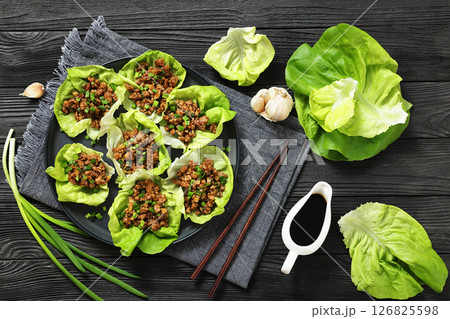 Fresh and Crispy Ground Chicken lettuce wraps 126825598