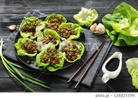 Fresh and Crispy Ground Chicken lettuce wraps 126825599