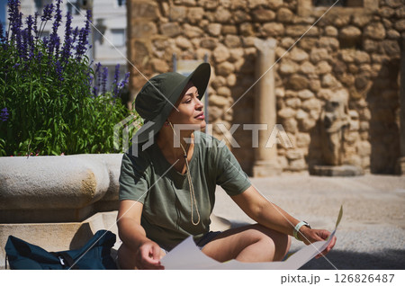 Traveler Exploring a Historic Stone City With Medieval Architecture and Scenic Nature 126826487