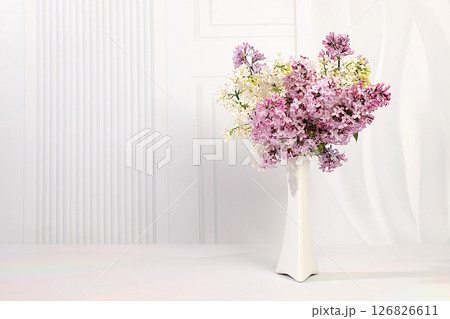 Abstract floral arrangement and banner for screen.Still life with beautiful spring flowers blooming white lilac in vase on elegant background,floral holiday card with summer greeting concept 126826611