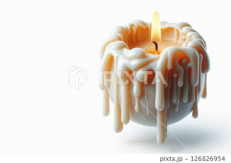 A round candle with drops of melted wax and fire. Space for text. 126826954