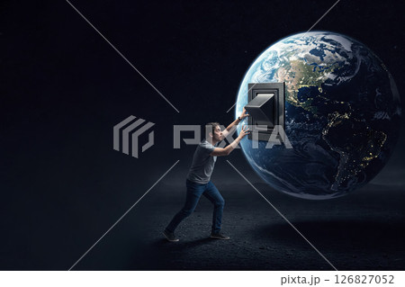 A person turns off the light on planet Earth in space. Space for text. A person turns off the light on planet Earth in space. Space for text. 126827052