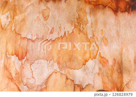 abstract pattern on silk fabric texture in yellow and brown tones 126828979