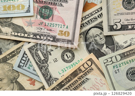 Stack of dollar bills. Hundred, fifty, twenty, ten, five dollars banknote close up Stack of dollar bills. Hundred, fifty, twenty, ten, five dollars banknote close up 126829420