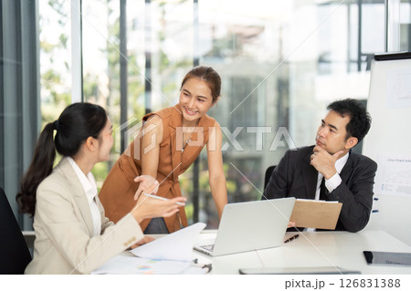 Business Meeting. Professionals collaborating in a modern office setting. 126831388