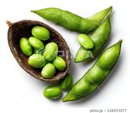 Fresh green edamame beans in and out of pods on white background 126833077