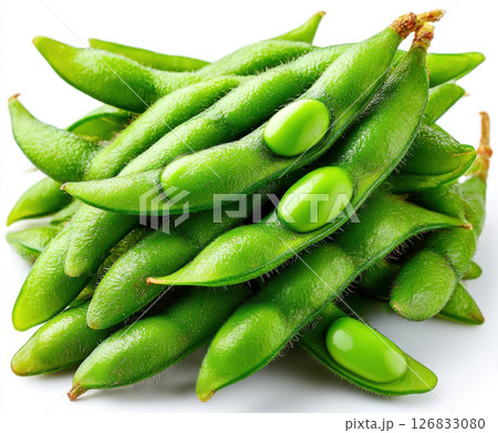 Fresh green edamame pods stacked with some beans visible Fresh green edamame pods stacked with some beans visible 126833080