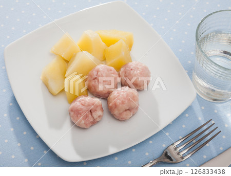 Close up of cooked on steam meatballs, served with potatoes 126833438