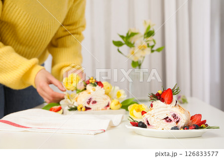 Meringue roll, concept of tasty and delicious food Meringue roll, concept of tasty and delicious food 126833577