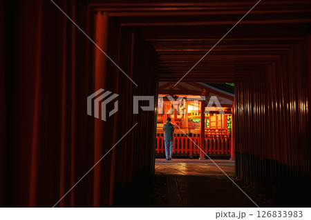 Japanese man sacred Fushimi inara Taisha shrine at night, Kyoto 126833983
