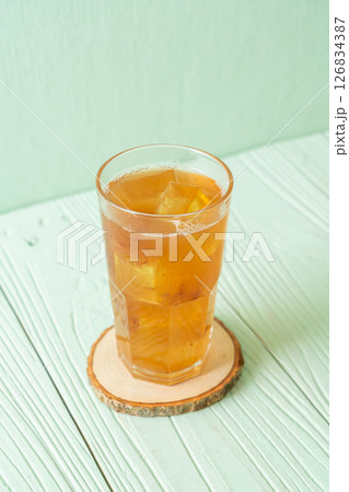 Delicious sweet drink tamarind juice and ice cube 126834387
