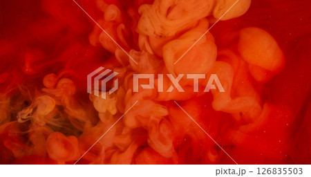 Smoke explosion. Fume paint. Orange wave pigment spill in red water. Color stream dye defocused dissolve abstract curl sparkling background. Smoke explosion. Fume paint. Orange wave pigment spill in red water. Color stream dye defocused dissolve abstract curl sparkling background. 126835503