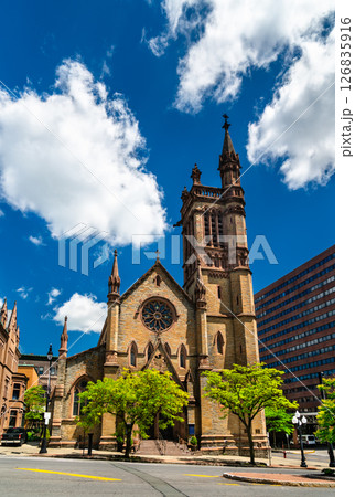 St Peter's Episcopal Church stands in Albany, New York with its Gothic Revival stone facade and soaring bell tower 126835916