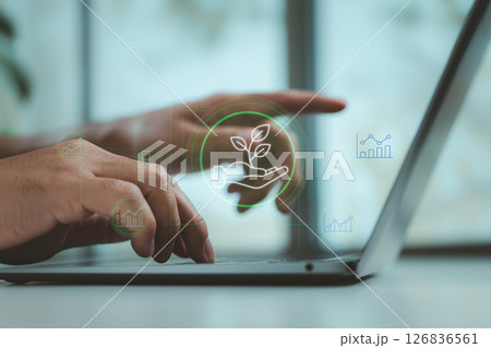Eco-Friendly Business Strategy with Sustainability Icon on Laptop Eco-Friendly Business Strategy with Sustainability Icon on Laptop 126836561